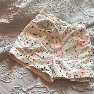 white Paint splatter jean shorts
